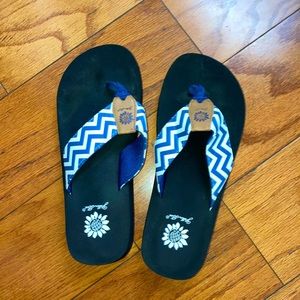 Yellow box flip flops